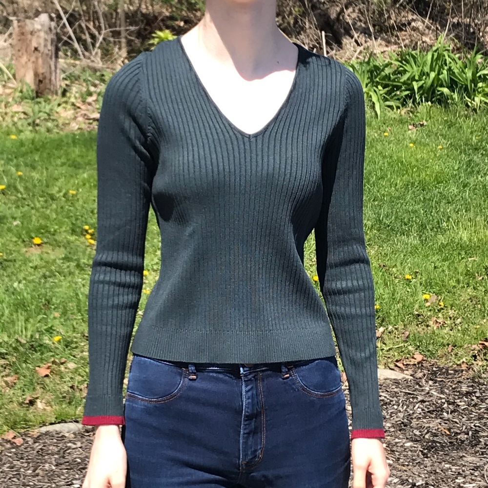 Green sweater with crisscross back